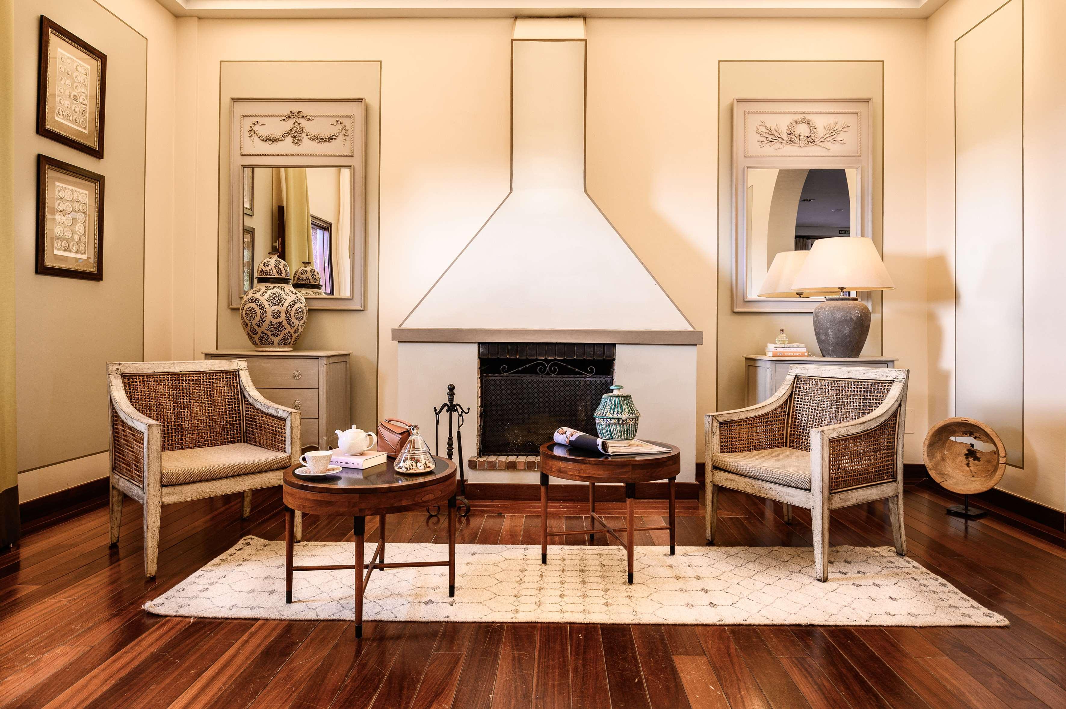 Hotel Hacienda Del Conde Melia Collection Golf & Spa - Adults Only Buenavista Del Norte Exterior photo A living room with a fireplace