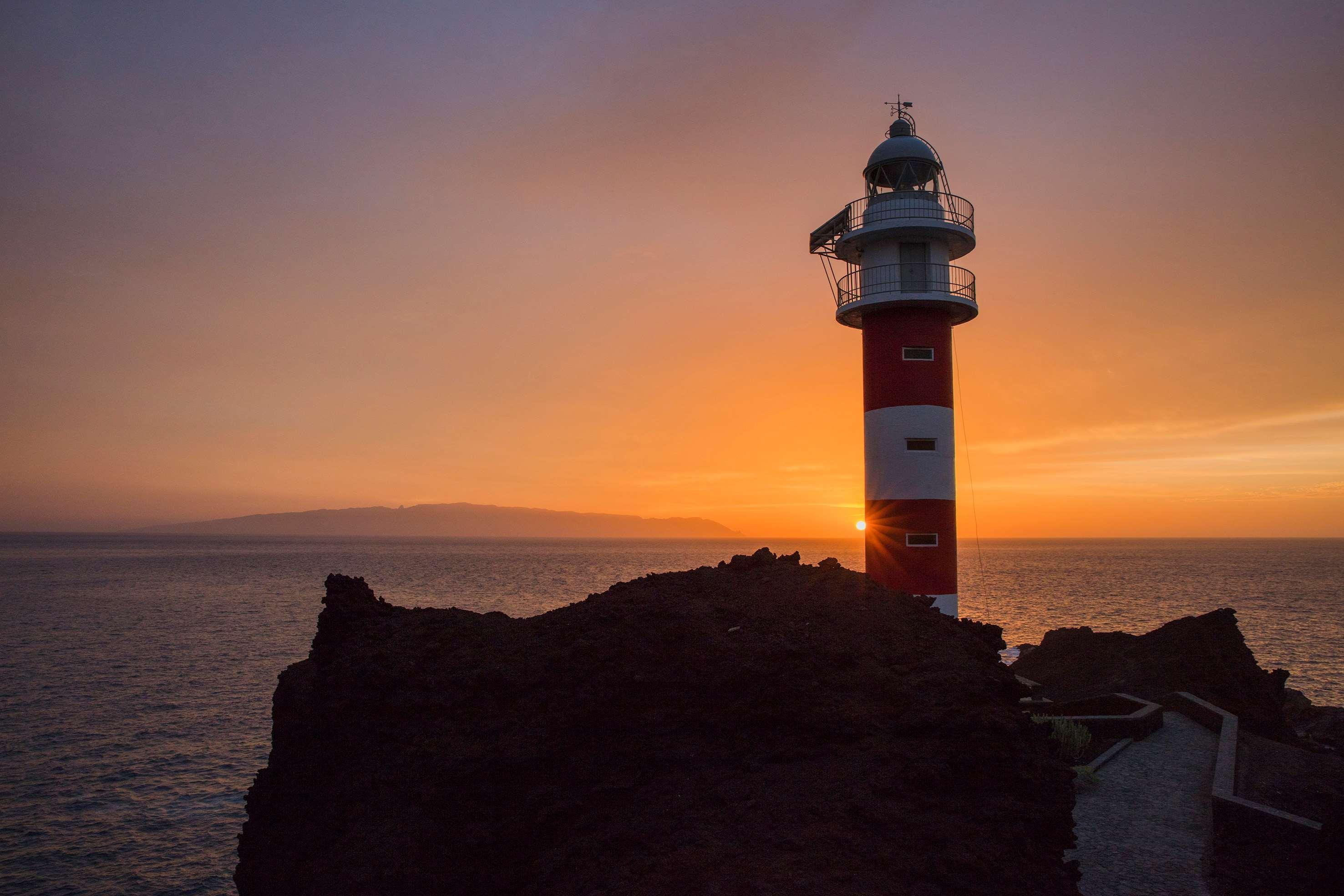 Hotel Hacienda Del Conde Melia Collection Golf & Spa - Adults Only Buenavista Del Norte Exterior photo The lighthouse at sunset